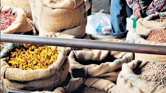 (FILES) The key change is that the weightage of food has decreased significantly and that of transport has increased. (AFP)