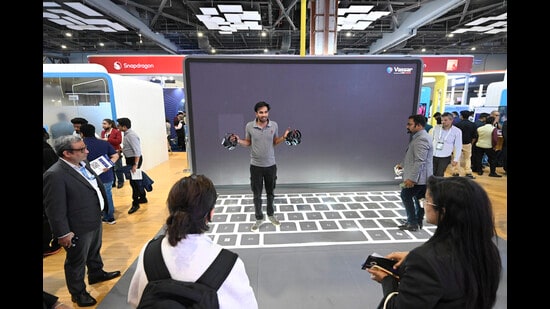 Visitors at the Microsoft pavilion at the AI Impact Summit 2026 at Bharat Mandapam in New Delhi on Tuesday. (Sanjeev Verma/HT Photo)