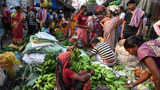 India's new inflation series cuts the weight of volatile items such as food to about 36.8% from nearly half. (AFP)