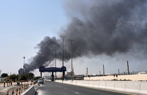 Smoke rises after an Iranian drone attack in the port area of Dubai on Sunday, 1 March 2026. (AP)