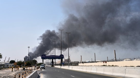 Smoke rises after an Iranian drone attack in the port area of Dubai on Sunday, 1 March 2026. (AP)