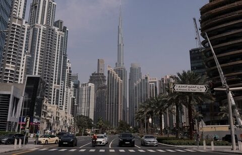 Vehicle wait at a traffic signal with Burj Khalifa in the background, after an Iranian attack, following United States and Israel strikes on Iran, in Dubai, United Arab Emirates, on 1 March 2026. (Reuters)