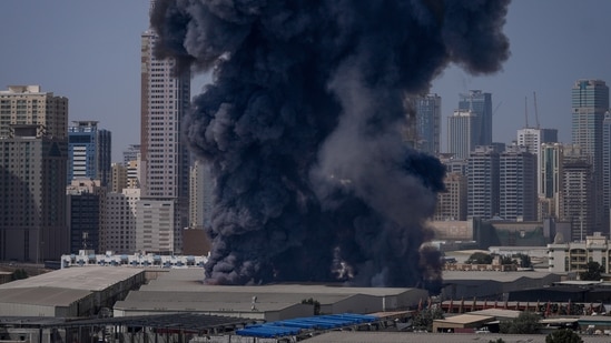 Asia’s ultra-rich is having second thoughts on Dubai as Iran war rages| Business News A black plume of smoke rises from a warehouse in the industrial area of Sharjah City following reports of Iranian strikes in Dubai on 1 March 2026. (AP)