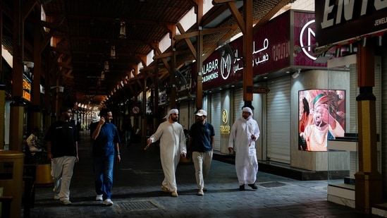 People walk at the Dubai Gold market in Dubai on Tuesday, 3 March 2026. (AP) (AP)