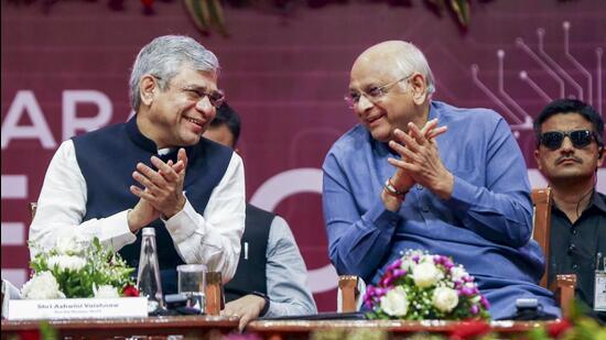 Union minister Ashwini Vaishnaw, left, interacts with Gujarat chief minister Bhupendra Patel during the Gujarat SemiConnect Conference, in Gandhinagar, Gujarat, on March 1 (PTI)