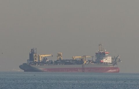 An oil tanker is pictured offshore in Dubai on 1 March 2026, as an escalating Iran war threatens production of crude oil in the Middle East. (AFP)