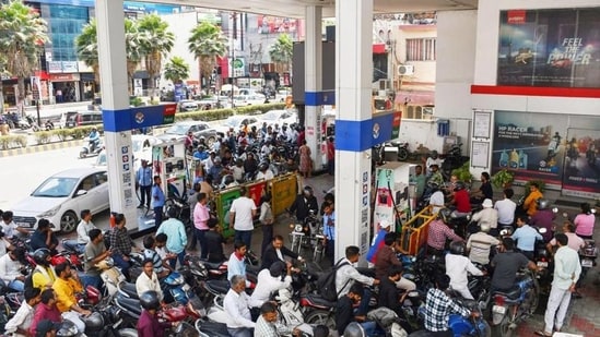 India eliminates key excise duty on petrol, diesel prices despite crude oil shocks| Business News Vehicles at a petrol pump in Prayagraj on Thursday. (HT)