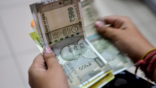 Traders reckon that the Reserve Bank of India will likely step in to avert a sharp slide in the rupee against the US dollar. (PTI)