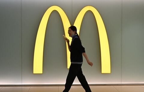 Why McDonald’s and KFC are growing like wildfire in China| Business News A woman walks past a McDonalds logo in a shopping mall in Beijing on March 4, 2026. (Photo by Pedro PARDO / AFP) (AFP)