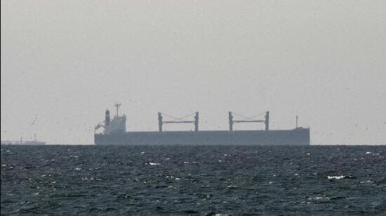 FILE PHOTO: A cargo ship in the Gulf, near the Strait of Hormuz, as seen from northern Ras al-Khaimah, near the border with Oman’s Musandam governance, amid the U.S.-Israeli conflict with Iran, in United Arab Emirates (REUTERS)