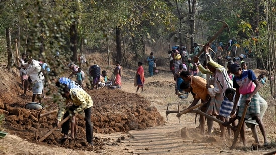 Road construction on at Balapur Dolkarpada village in Maharashtra's Palghar district. (AFP Photo)