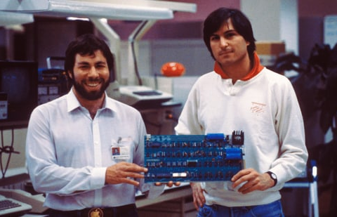 A garage startup to a cult, from turbulence to dominance| Business News Apple co-founders Steve Jobs and Steve Wozniak with an early circuit board (Official image)