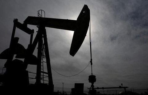 A pump jack operates near a crude oil reserve. (Reuters)