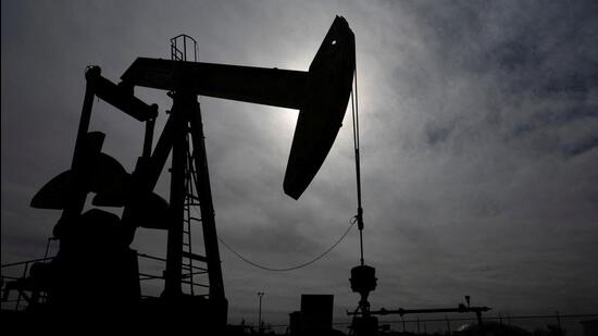 A pump jack operates near a crude oil reserve. (Reuters)