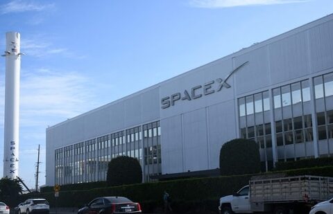 Vehicles drive past a SpaceX Falcon 9 rocket displayed outside a Space Exploration Technologies Corp. facility in Hawthorne, California. (AFP)