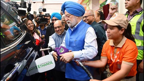 Union petroleum minister Hardeep Singh Puri fills E85 fuel in a car in New Delhi. (ANI)