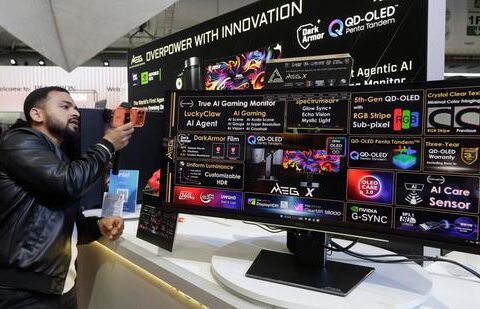 Global PC shipments decline after nine positive quarters as memory crunch deepens A visitor takes photo of a True AI Gaming Monitor at the Computex Taipei exhibition in Taiwan on June 2. (AP)