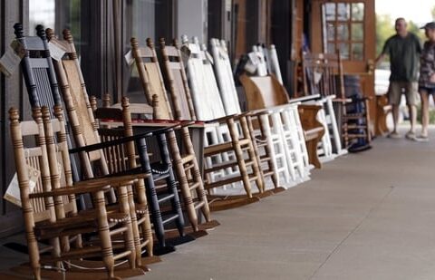 Rocking chairs are displayed for sale at a Cracker Barrel. The chain just hired a former restaurant executive as its next CEO.