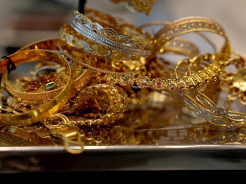 Gold prices remain high in India; check 22K, 24K rates in Mumbai, Delhi, Bengaluru Gold at a store as prices remain elevated across major Indian cities (REUTERS)