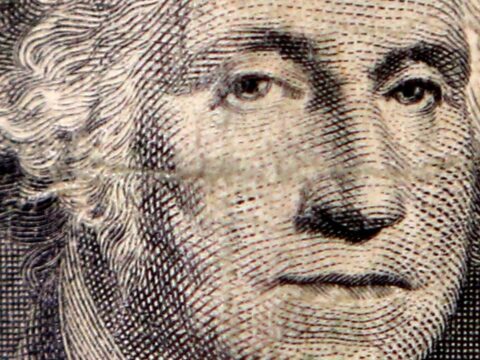 The image of first US president George Washington on a dollar bill is seen in a photo illustration. (Reuters)