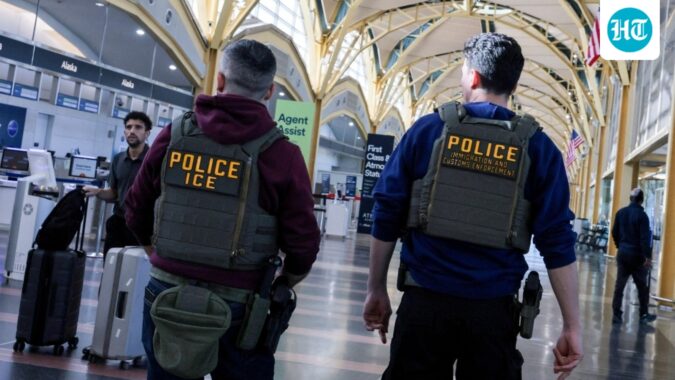 Immigration and Customs Enforcement agents patrol Ronald Reagan Washington National Airport.