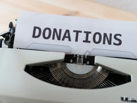 In 2020 American households earning over $500,000 a year claimed more than half the cash that government spent on income-tax breaks for charitable giving. (Unsplash)
