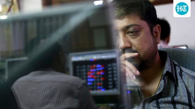File photo: A broker reacts while trading at his computer terminal at a stock brokerage firm in Mumbai (REUTERS)