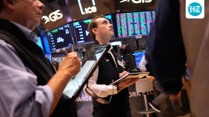 US stocks rise as cooler inflation data eases pressure on the Dow, S&P 500 and Nasdaq. (AP Photo/Seth Wenig) (AP Photo/Seth Wenig)