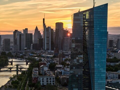 The sun has set behind the buildings of the banking district and the European Central Bank, right, in Frankfurt, Germany, Tuesday, Sept. 1, 2026. (AP Photo/Michael Probst)