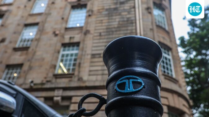 The Tata Group logo is displayed on a pedestrian safety pole near Bombay House, the Tata Group headquarters building, in Mumbai. (Representative Image/Bloomberg)