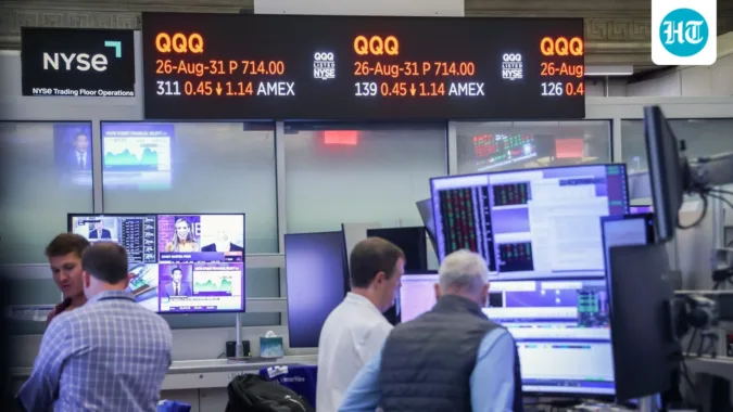 QQQ rises as AI stocks rally and Treasury yields fall. (Photographer: Michael Nagle/Bloomberg) (Bloomberg)