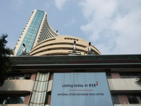 A screen displays a message of the National Stock Exchange (NSE) listing ceremony at the Bombay Stock Exchange (BSE) in Mumbai on September 24 (REUTERS)