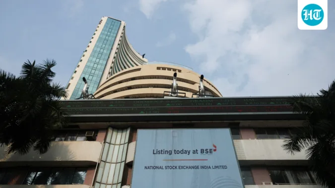 A screen displays a message of the National Stock Exchange (NSE) listing ceremony at the Bombay Stock Exchange (BSE) in Mumbai on September 24 (REUTERS)