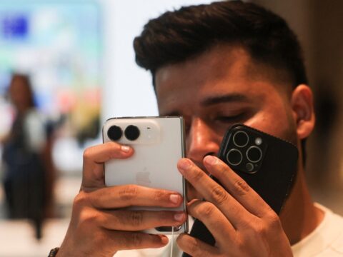A customer uses Apple's new foldable iPhone Duo at the Apple store in Mumbai, India, October 23, 2026. (REUTERS)