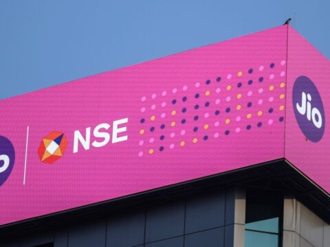 Jio Platforms opens on BSE over 21% higher with IPO debut at ₹1,357 Signage for Jio Platforms Ltd. ahead of the company's listing ceremony at the National Stock Exchange (NSE) in Mumbai, India, (Bloomberg)