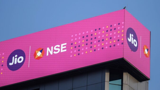 Jio Platforms opens on BSE over 21% higher with IPO debut at ₹1,357 Signage for Jio Platforms Ltd. ahead of the company's listing ceremony at the National Stock Exchange (NSE) in Mumbai, India, (Bloomberg)