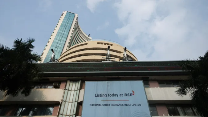 A screen displays a message of the National Stock Exchange (NSE) listing ceremony at the Bombay Stock Exchange (BSE) in Mumbai on September 24 (REUTERS/File)