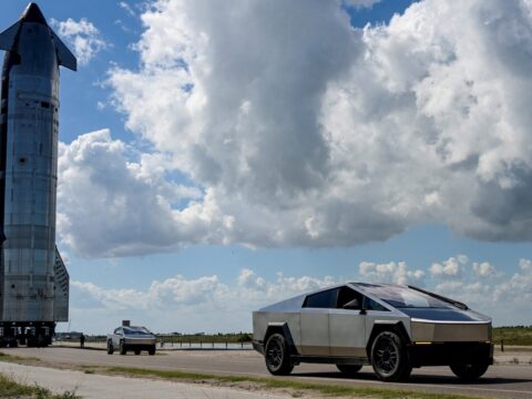 Tesla Cybertrucks lead the way as the SpaceX Starship spacecraft rolls out toward the launch pad before its 11th test flight from the company's complex in Starbase, Texas, US. (REUTERS)