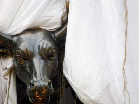 A bronze replica of a bull is seen at the gates of the Bombay Stock Exchange (BSE) building in Mumbai (REUTERS/File)