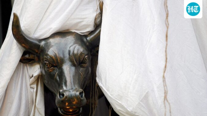 A bronze replica of a bull is seen at the gates of the Bombay Stock Exchange (BSE) building in Mumbai (REUTERS/File)