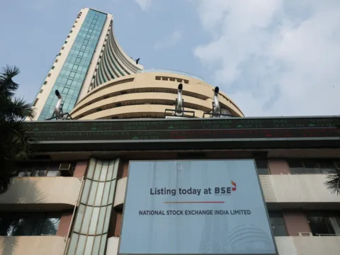 A screen displays a message of the National Stock Exchange (NSE) listing ceremony at the Bombay Stock Exchange (BSE) in Mumbai on September 24 (REUTERS/File)
