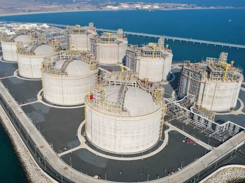 Oil prices slip as US-Iran tensions persist; Brent falls below $116 This undated handout photograph shows a view of an oil facility in Kuwait City. (AFP/File Image)