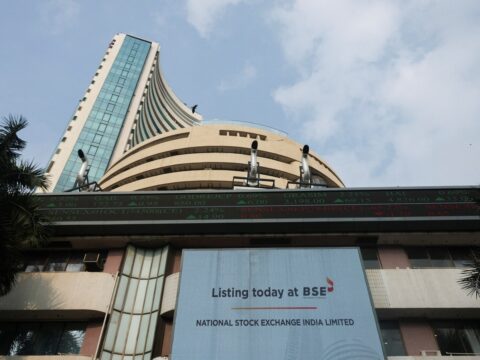 A screen displays a message of the National Stock Exchange (NSE) listing ceremony at the Bombay Stock Exchange (BSE) in Mumbai on September 24 (REUTERS/File)